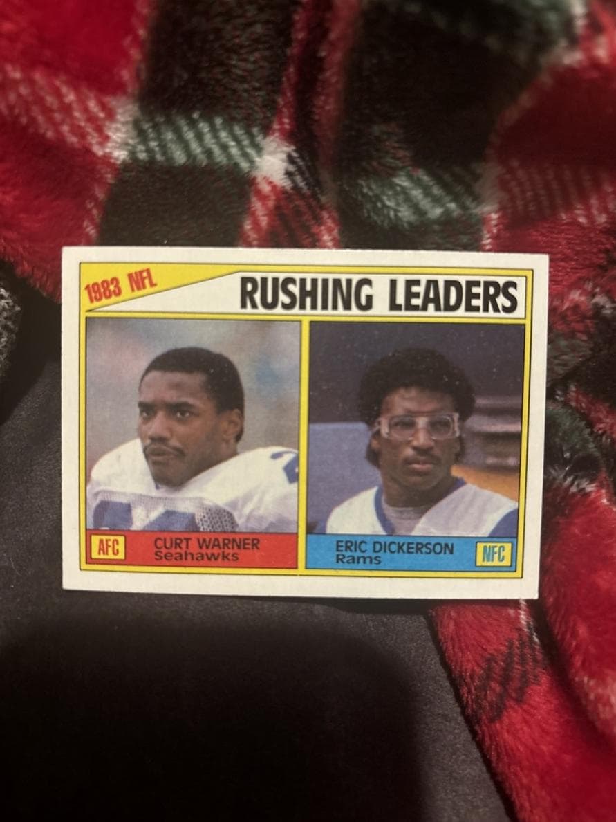 1983 Rushing Leaders (Curt Warner / Eric Dickerson) 1984 topps
