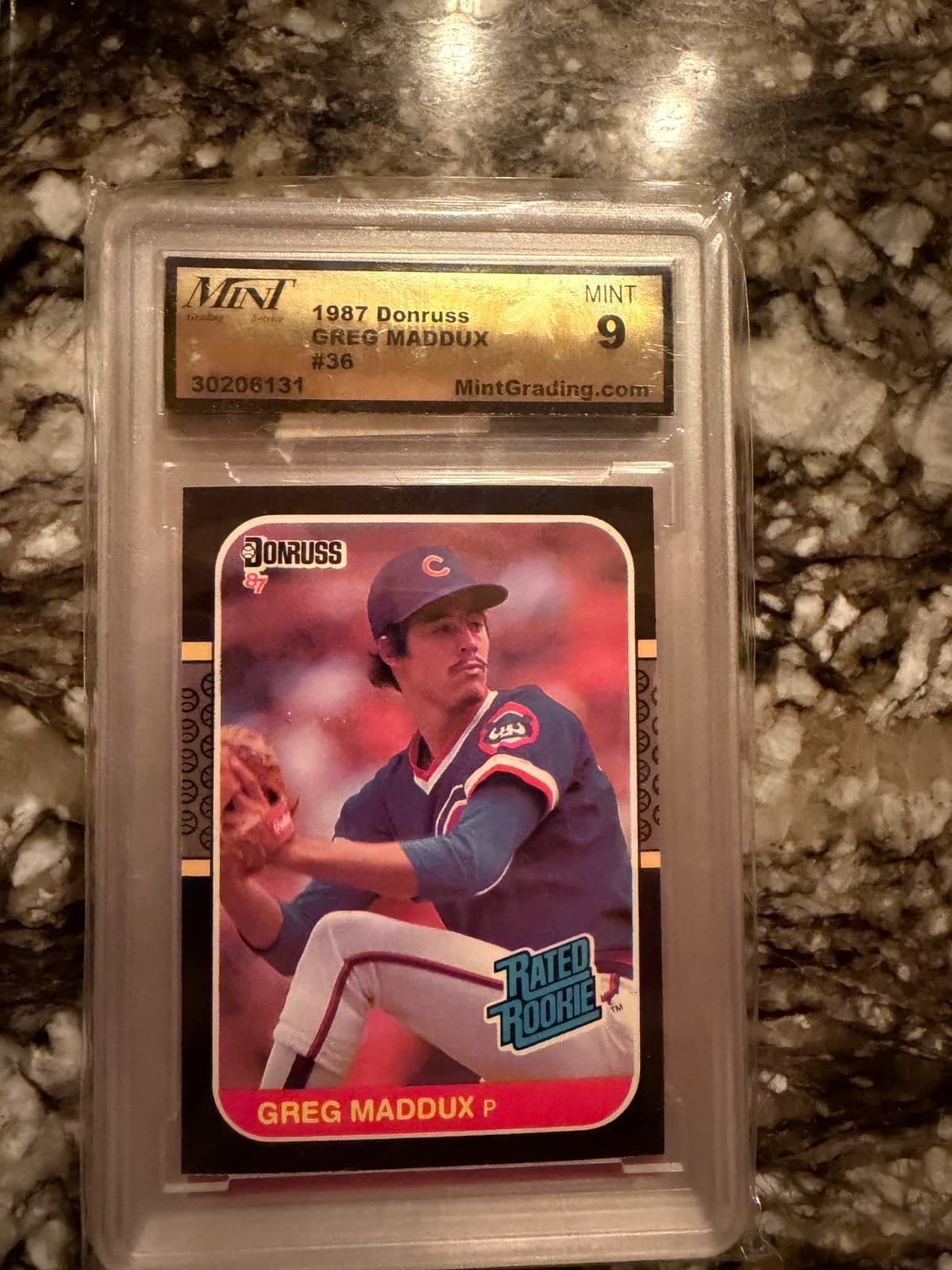 Greg Maddux trading card