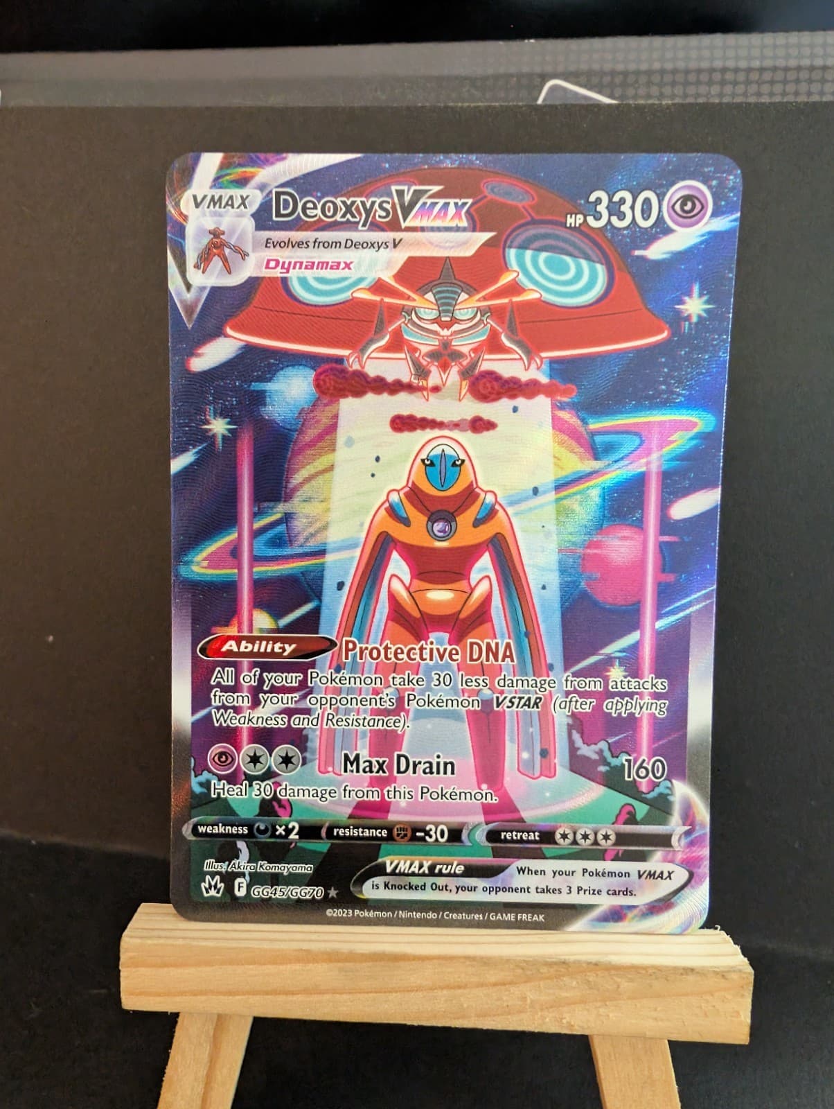 Deoxys VMAX trading card