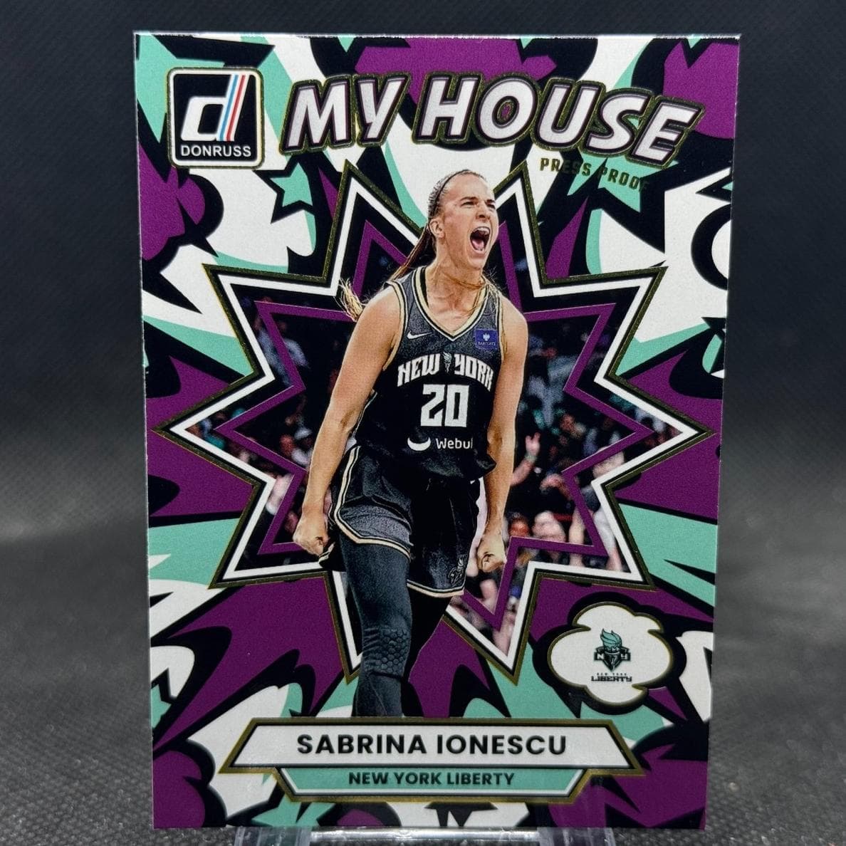 Sabrina Ionescu trading card