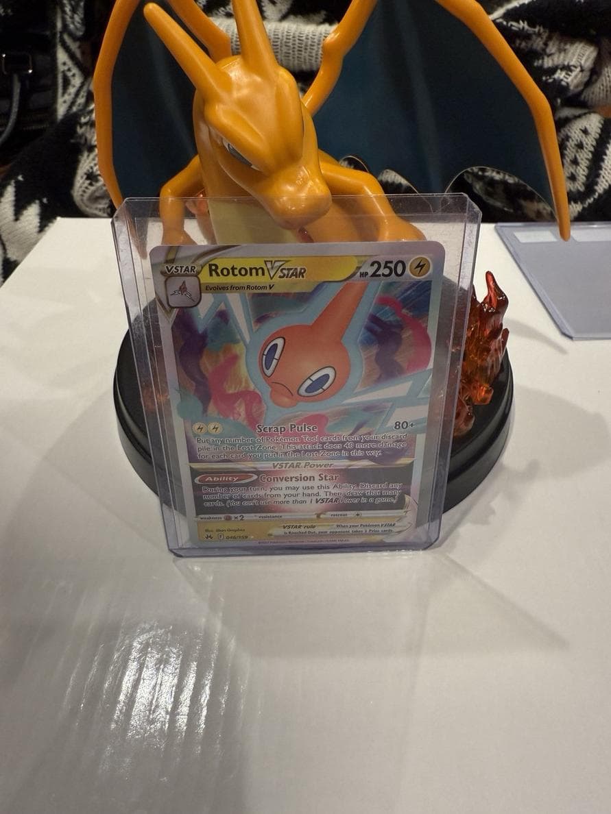 Rotom VSTAR trading card